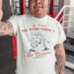 Man with tattooed arm wearing "Can the devs do something?" NFT T-shirt