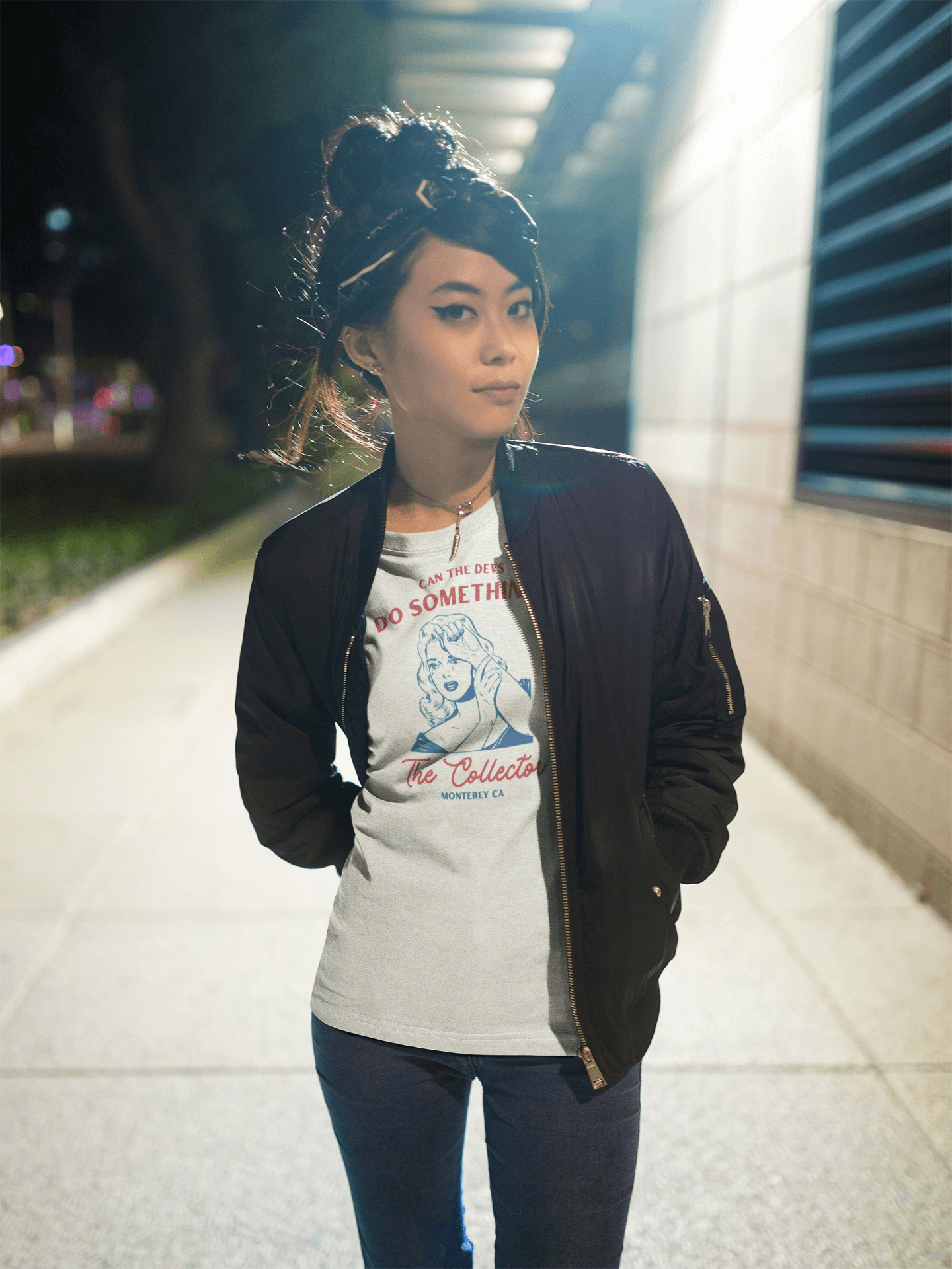 Urban asian woman wearing "Can the devs do something?" NFT T-shirt